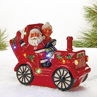 Julemand med sin kone i bil